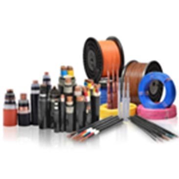 An assortment of colorful cables and spools, including coiled wires and electrical components